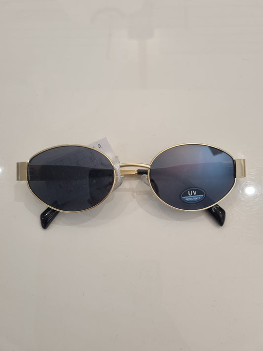Goldene ovale Sonnenbrille mit UV-Schutz